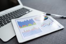 digital-computer-with-financial-graph-2025-03-25-14-33-52-utc